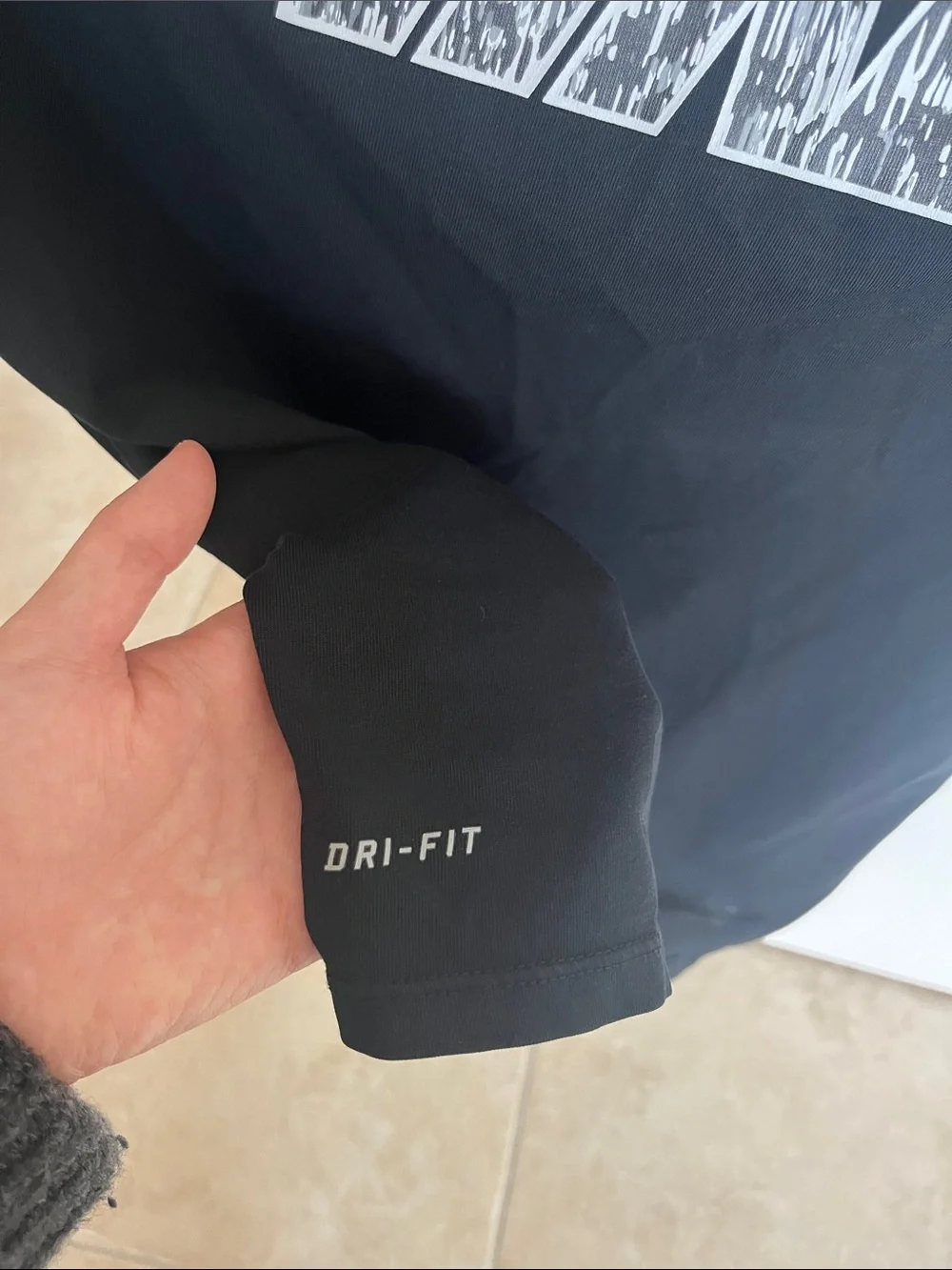Nike Black Short-Sleeve Tee with Patterned White Logo